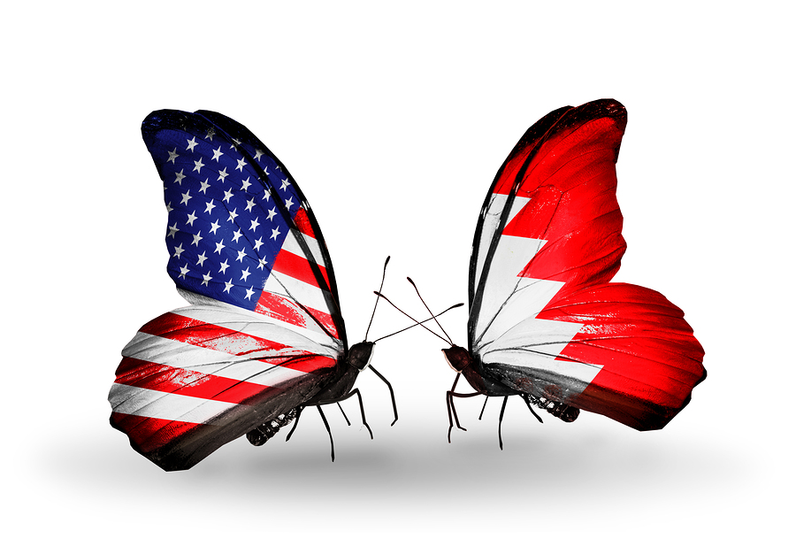 Two butterflies with flags on wings as symbol of relations USA and Bahrain