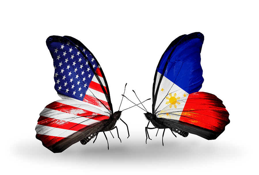 two butterflies with flags on wings as symbol of relations usa a