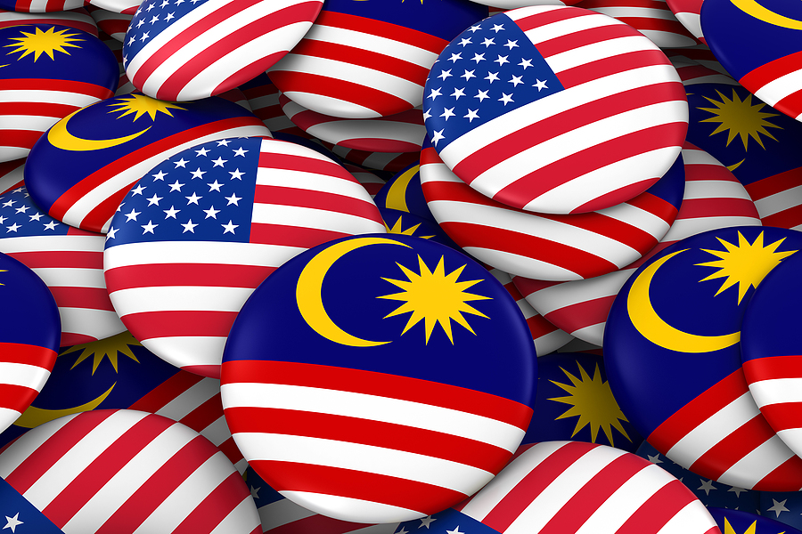 usa and malaysia badges background pile of american and malays